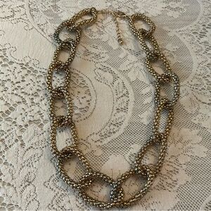 Elegant Gold Tone Link Necklace. Necklace is 19” with 2” extender. Park Lane.